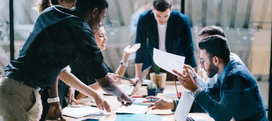 Customer acquisition strategy discussed in a business meeting
