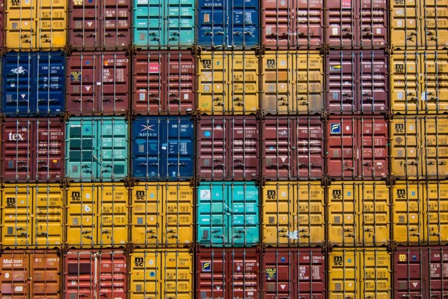 Shipping containers stacked together into a grid