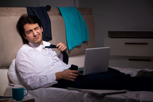 Small business owner up late earning extra income