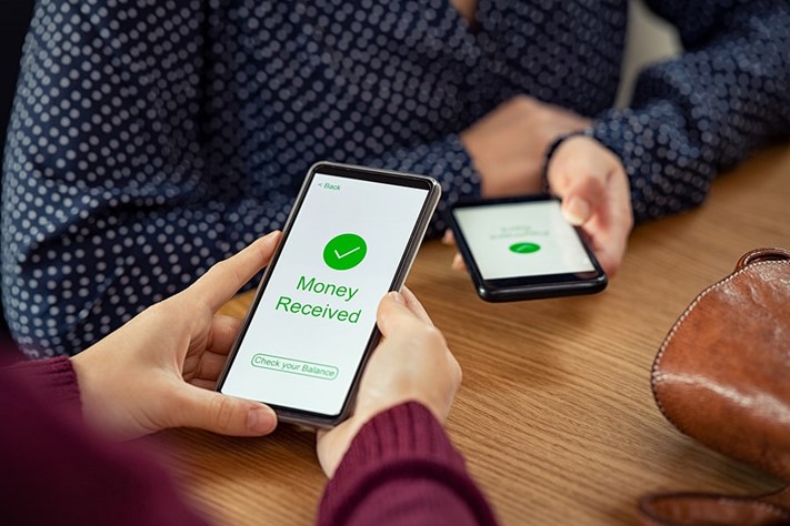 Individuals transacting through mobile devices within a cashless society