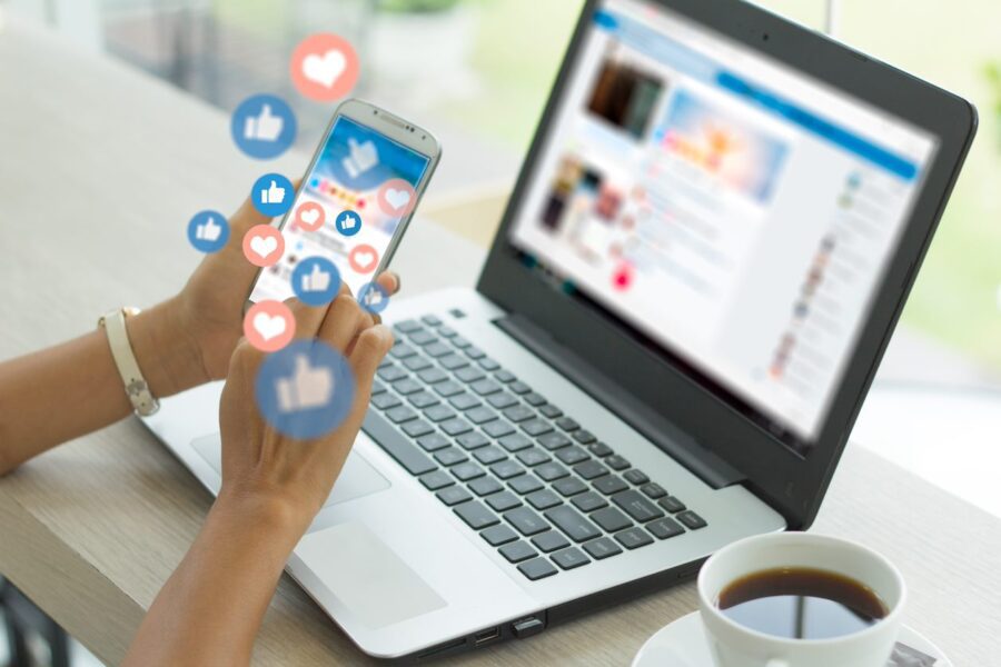 Young woman using smart phone showing social media concepts